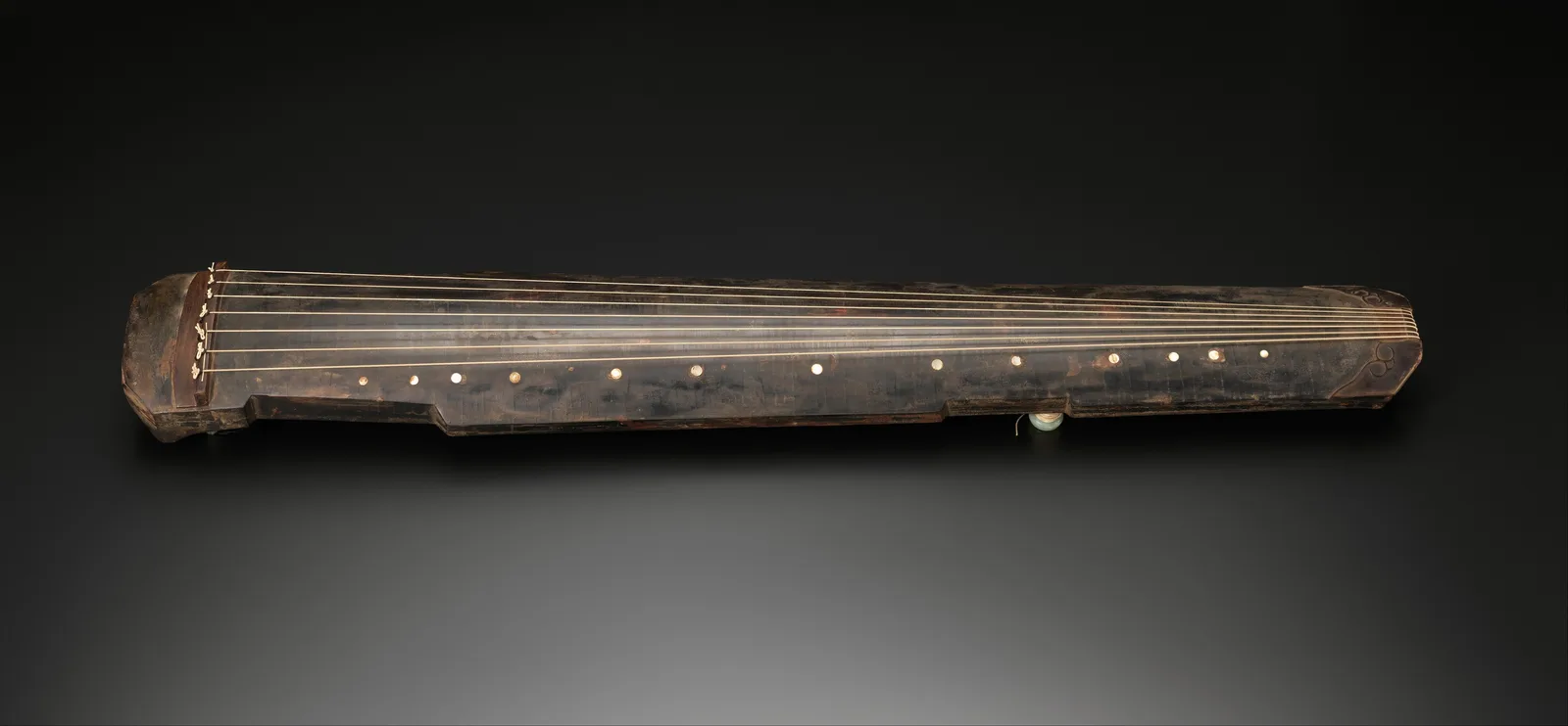 A guqin, a Chinese seven-stringed zither, seen from above
